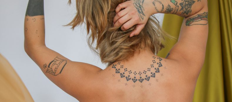 How Much Does a Back Tattoo Hurt?